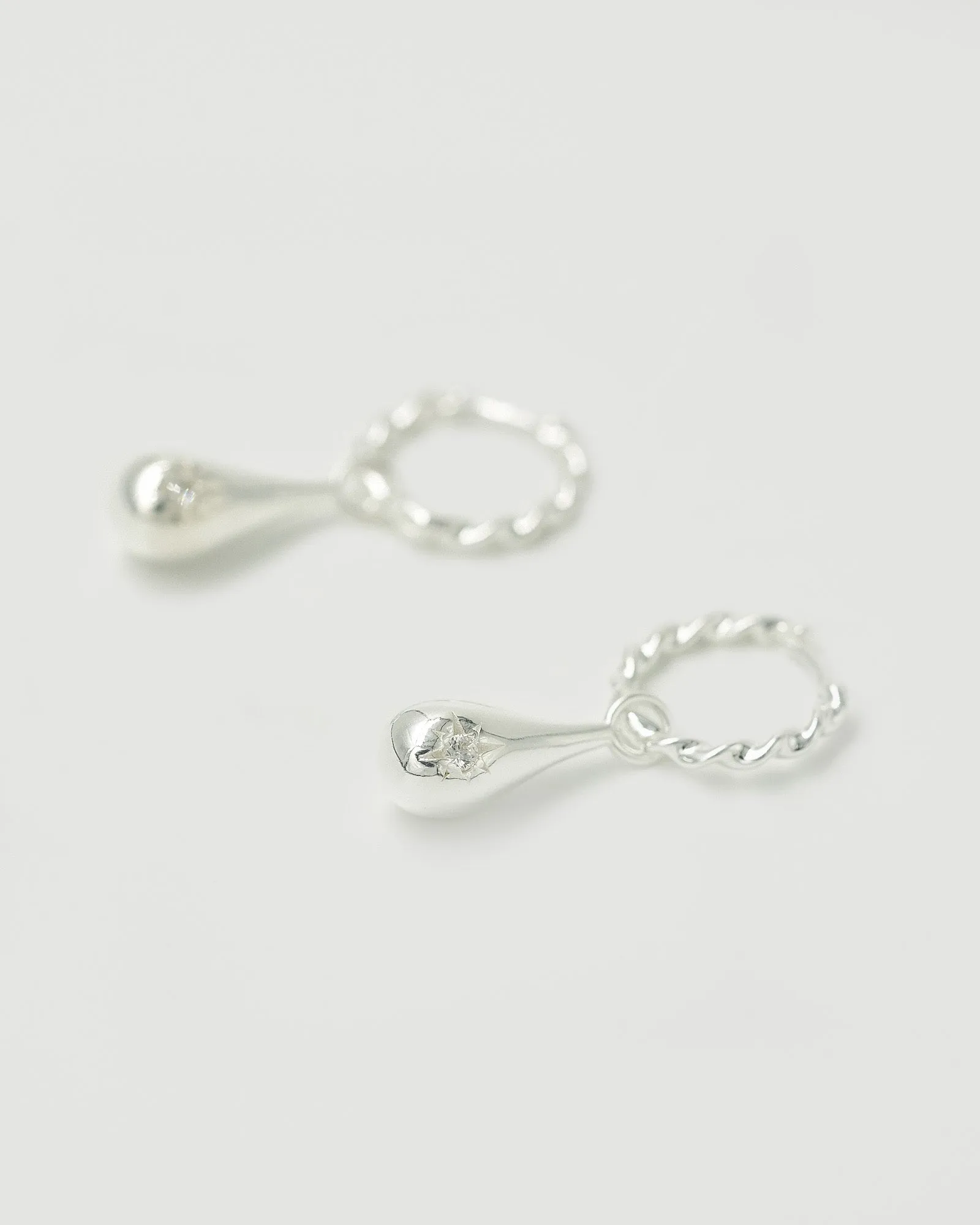 Tear Drop Twist Sleeper Earrings Clear (RRP $179AUD)