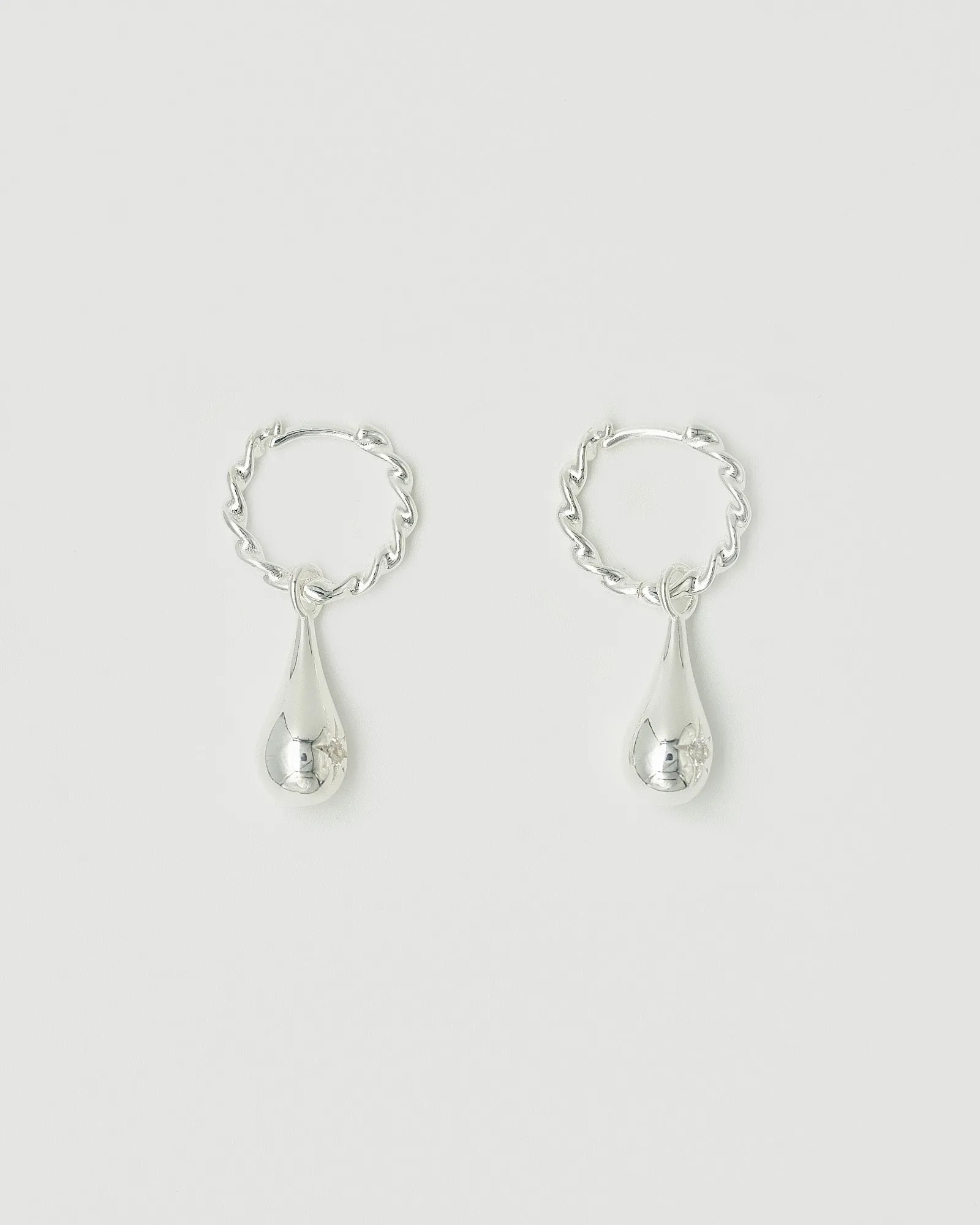 Tear Drop Twist Sleeper Earrings Clear (RRP $179AUD)